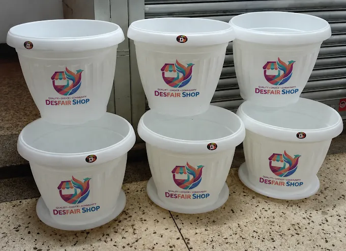 White plastic buckets in assorted sizes at Des fair shop, Arua Park, Kampala